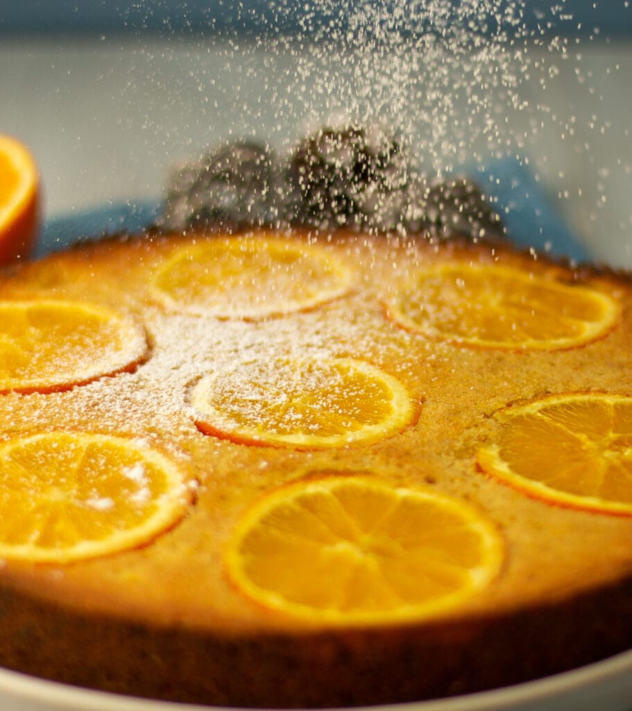 Sicilian cake with whole oranges sprinkled